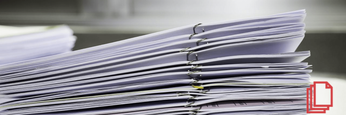 stack of documents, binded together with rings, document solutions or document management concept
